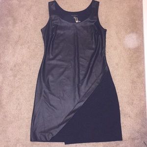 Black faux leather dress w/ crossover hem.